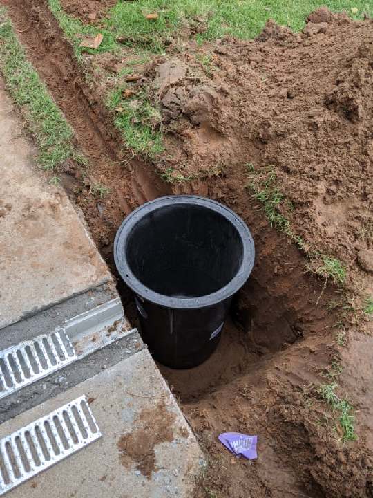 Sump Pump Drain Cavity Connected to Channel Drain